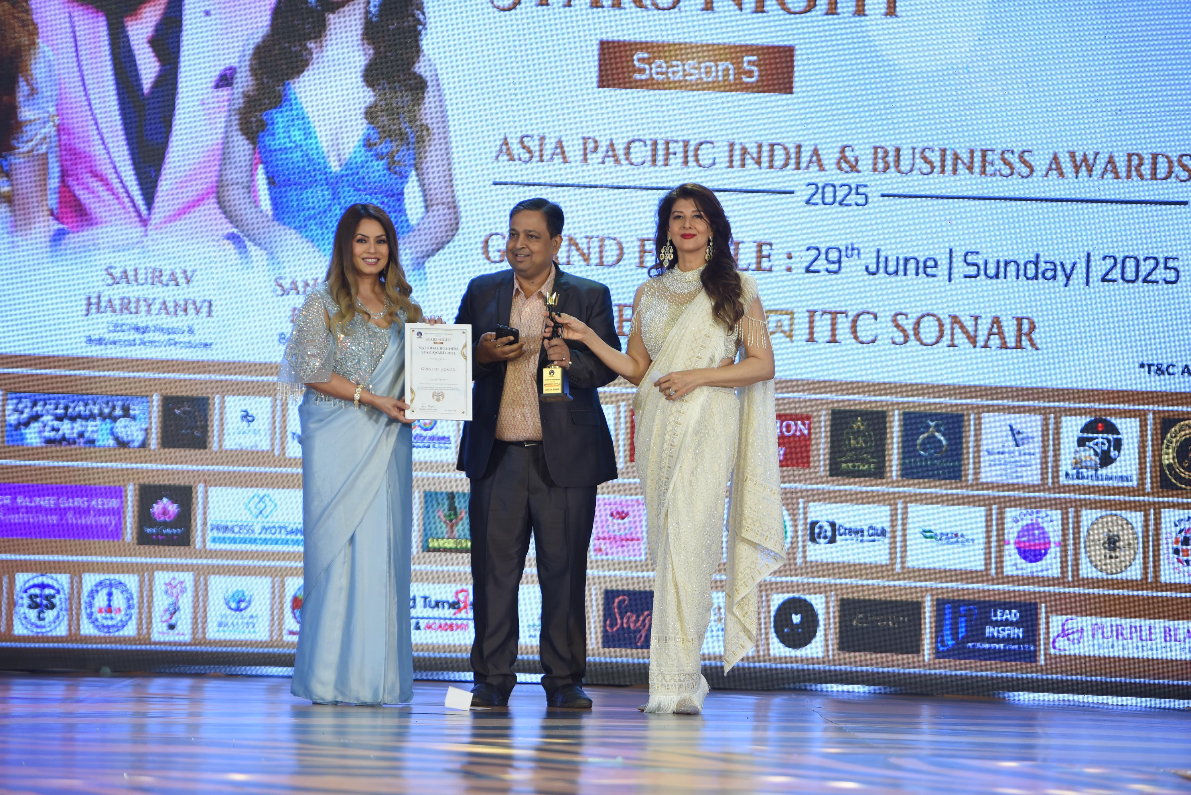 Astrologer Praveen Kumar on stage at Asia Pacific Awards 2025